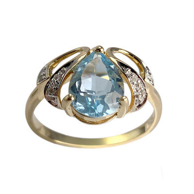 Bague d'occasion or 750 2 tons diamant topaze bleue traitée