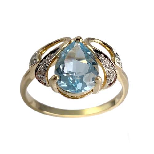 Bague d'occasion or 750 2 tons diamant topaze bleue traitée