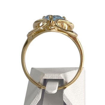 Bague d'occasion or 750 2 tons diamant topaze bleue traitée