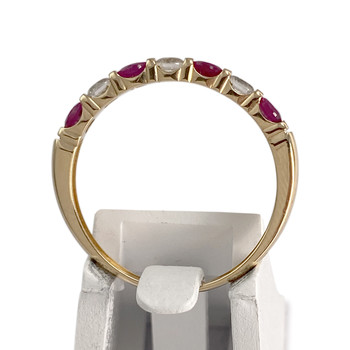 Pre-owned 750 yellow gold ring with ruby-cut zirconias