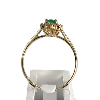Tweedehands ring van 750 geelgoud met diamant en smaragd
