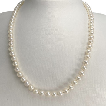 Collier d'occasion or 750 jaune perle de culture du japon