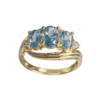 Bague d'occasion or 750 2 tons topazes bleues traitées diamants
