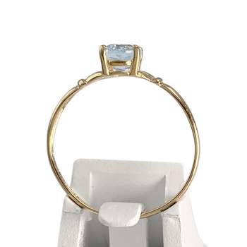 Bague d'occasion or 750 jaune topaze bleue traitée