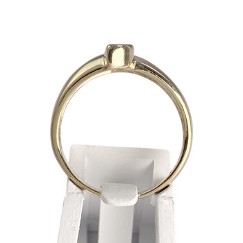 Pre-owned 585 two-tone gold ring with diamonds and an emerald
