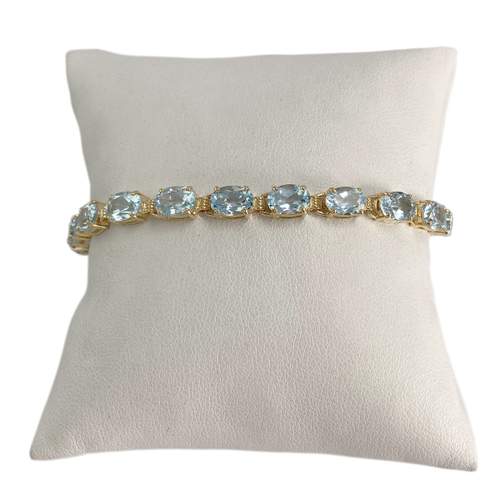 Bracelet d'occasion or 750 jaune topazes bleues traitées 19cm
