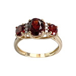 Bague d'occasion or 375 jaune grenats diamants - vue 1