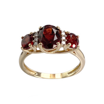 Bague d'occasion or 375 jaune grenats diamants