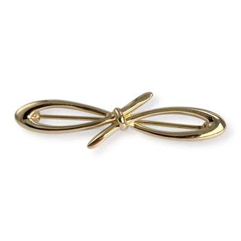 Tweedehands broche van 750 geelgoud met strikmotief