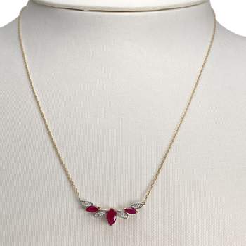 Collier d'occasion  or 750 2 tons maille forçat rubis diamants