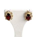 Boucles d'oreilles d'occasion or 375 jaune motif fleurs grenats - vue 1