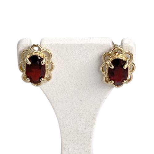 Boucles d'oreilles d'occasion or 375 jaune motif fleurs grenats