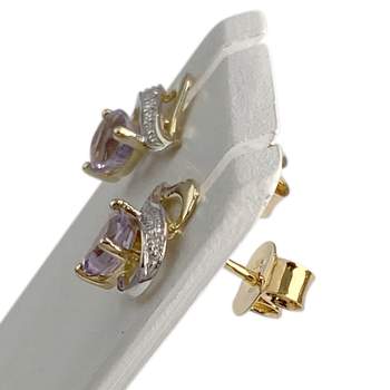 Tweedehands oorbellen van 375 goud in twee tinten met amethist