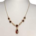 Collier d'occasion or 750 jaune maille forcat grenat - vue 2