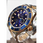 Montre d'occasion ROLEX Submariner Date homme mouvement automatique certifié (cosc) bracelet or jaune 750/000 et acier - vue D1