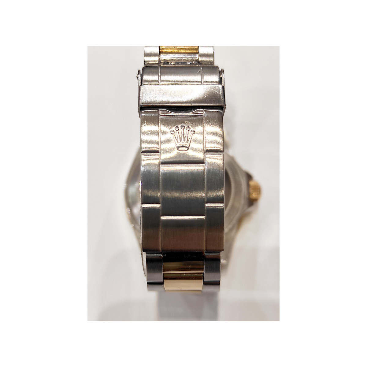 Montre d'occasion ROLEX Submariner Date homme mouvement automatique certifié (cosc) bracelet or jaune 750/000 et acier - vue D4