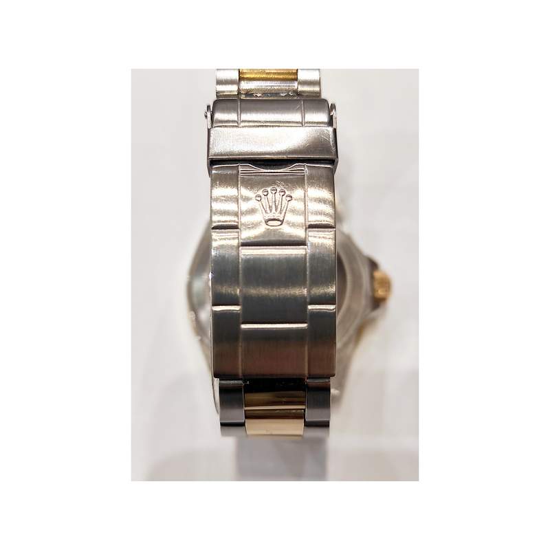 Montre d'occasion ROLEX Submariner Date homme mouvement automatique certifié (cosc) bracelet or jaune 750/000 et acier - vue D4