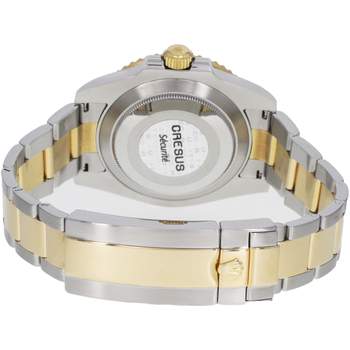 Montre d'occasion ROLEX Submariner Date Céramique homme mouvement automatique certifié (cosc) bracelet or jaune 750/000 et acier