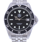 Montre d'occasion TAG HEUER 1000 Professional Vintage homme quartz bracelet acier - vue D1
