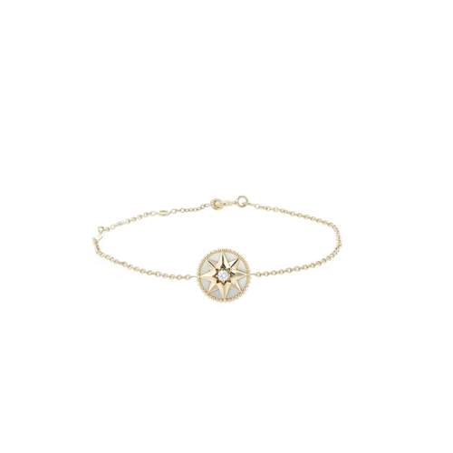 Bracelet d'occasion DIOR Rose des vents femme or jaune 750/1000