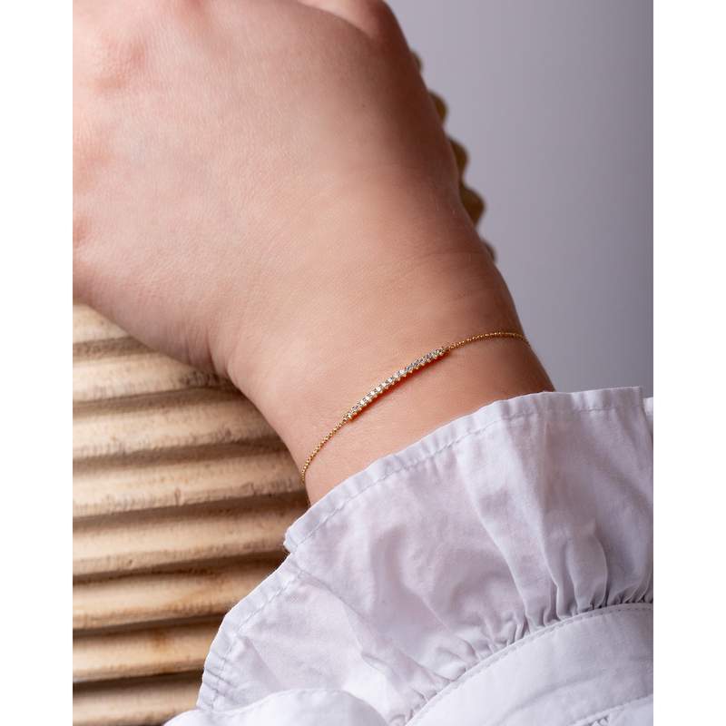 Bracelet CRESUS Barrette griffes femme or jaune 750/1000 - vue porté 1