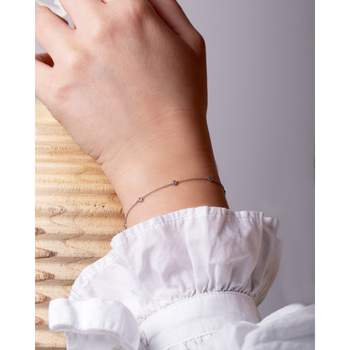 Bracelet CRESUS Serti clos femme or blanc 750/1000