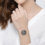 Montre Boss femme multifonction acier doré rose - vue porté 1