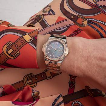 Guess Co dameshorloge van roestvrij staal in twee kleuren, roze