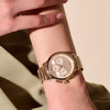 Montre OLIVIA BURTON multi function femme analogique, bracelet acier doré rose - vue Vporté 1