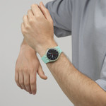 Montre SWATCH essentials mixte bracelet plastique turquoise - vue porté 2