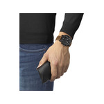 Montre Tissot homme chronographe acier noir cuir marron - vue porté 1