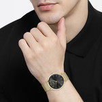 Montre Boss homme acier doré jaune maille milanaise - vue porté 1