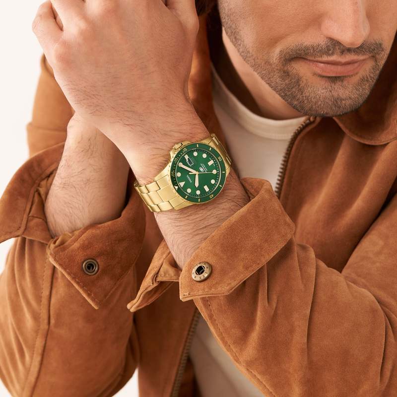 Montre FOSSIL Blue homme acier doré - vue porté 1
