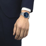 Montre TISSOT t-classic homme automatique bracelet acier gris - vue porté 1