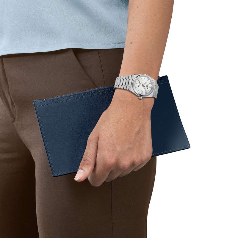 Montre TISSOT T-CLASSIC PRX POWERMATIC 80 mixte automatique cadran gris bracelet acier inoxydable - vue porté 1