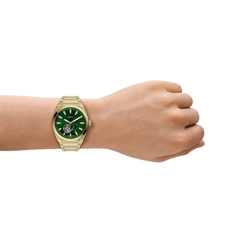 Montre FOSSIL automatic homme automatique, bracelet acier inoxydable doré - vue porté 1