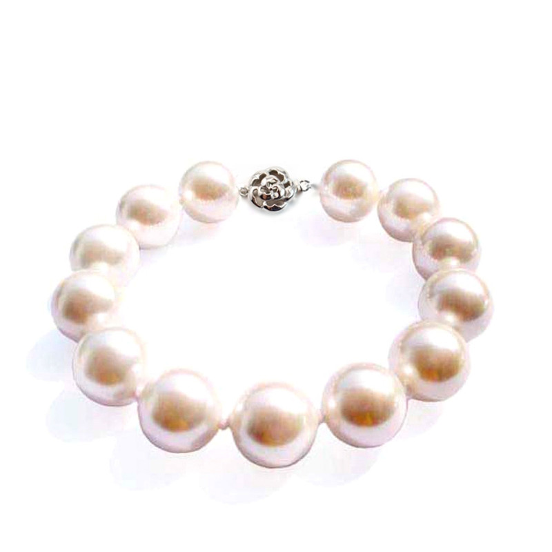 Bracelet en Perles de culture blanches et fermoir fleur en Argent 925