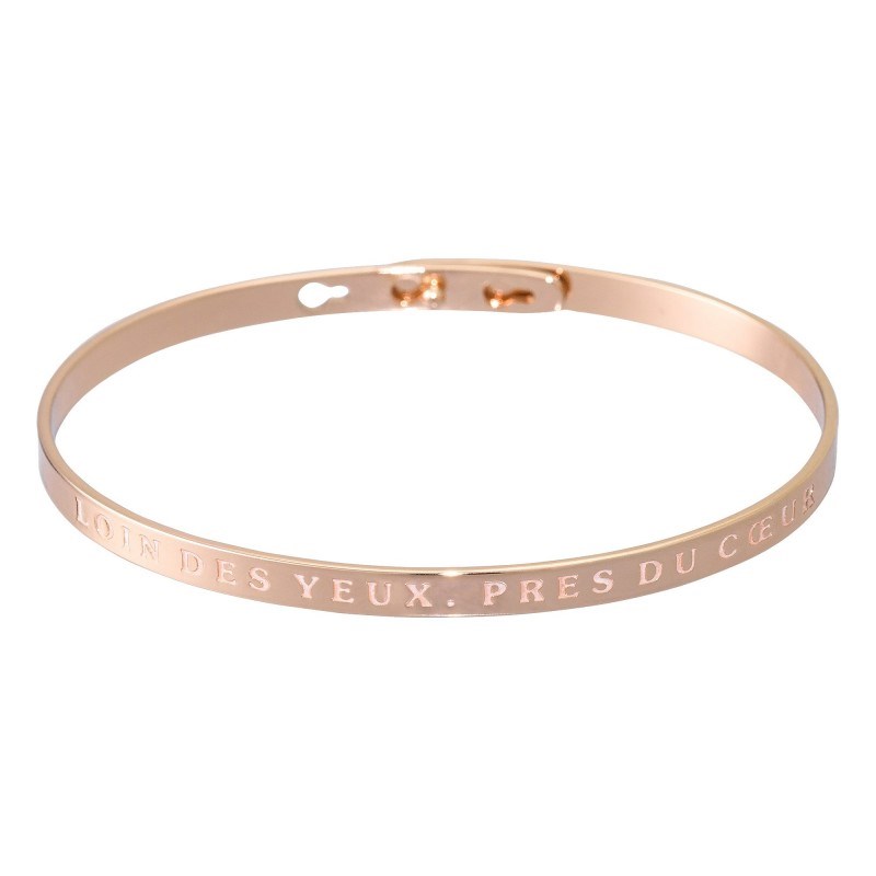 'LOIN DES YEUX, PRES DU COEUR' bracelet jonc rosé à message