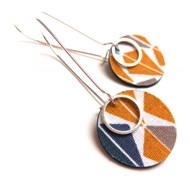 Dormeuses longues pop cuir et tissu géométrique