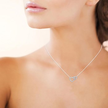Ketting 2 harten 2 maten bezet met zirkonium oxides Zilver 925 Gerhodineerd