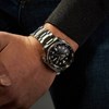 Montre Seiko 5 Sports automatique acier
lunette noire chiffres dorés - vue V2