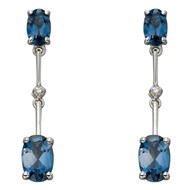 Boucle d'oreille topaze bleue et diamant en Or blanc 375/1000