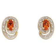 Boucle d'oreille opal et diamant en or 375/1000