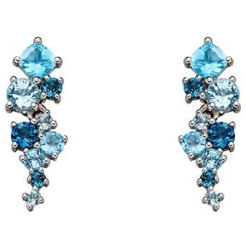 Boucle d'oreille topaze bleue en or blanc 375/1000