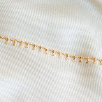 Fijne vergulde armband met kwastjes