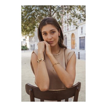 Boucles d'oreilles pendantes en acier dorées avec chaîne orné d'une pierre de crytal blanche