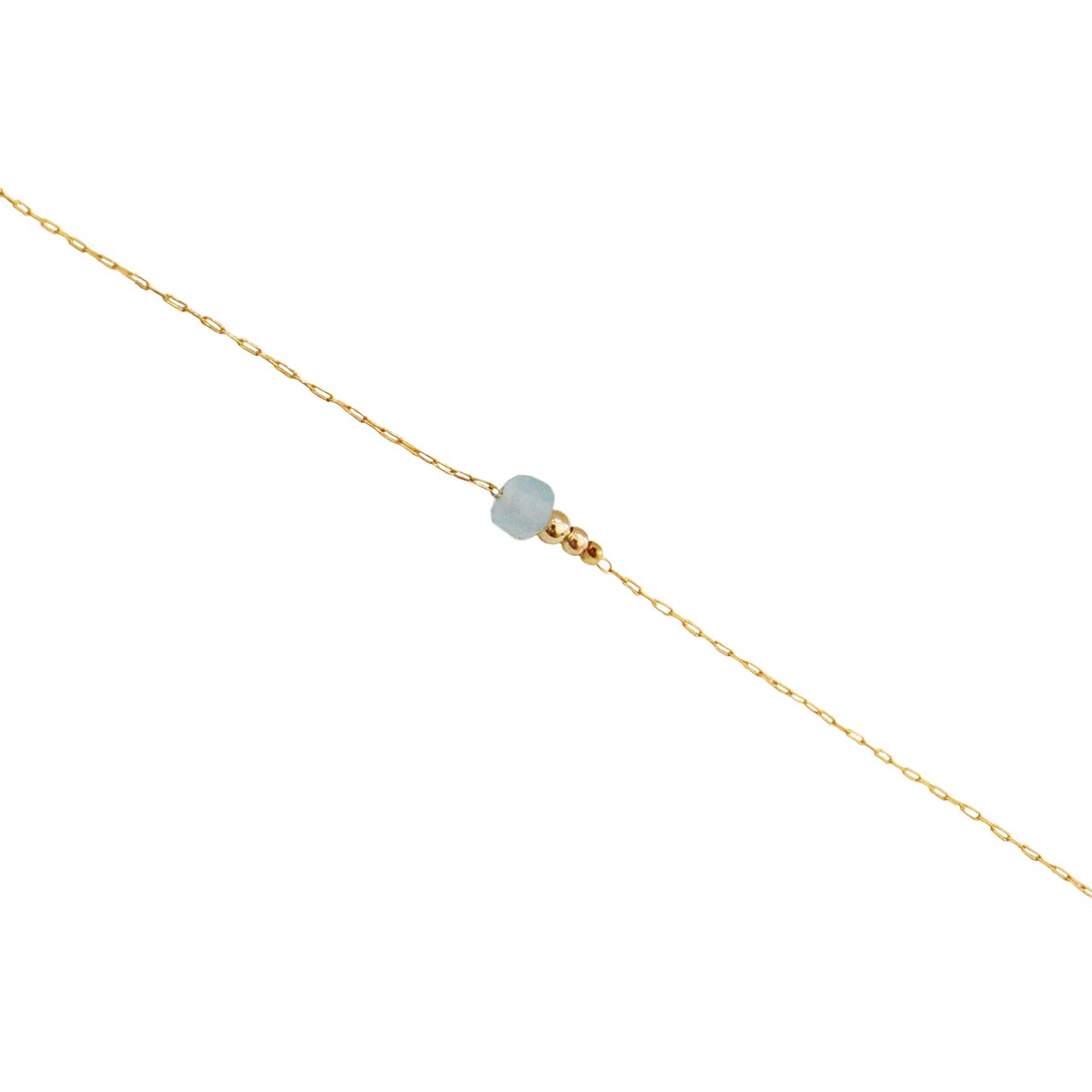 Bracelet  fin orné d une perle semi-precieuse  de Aigue Marine