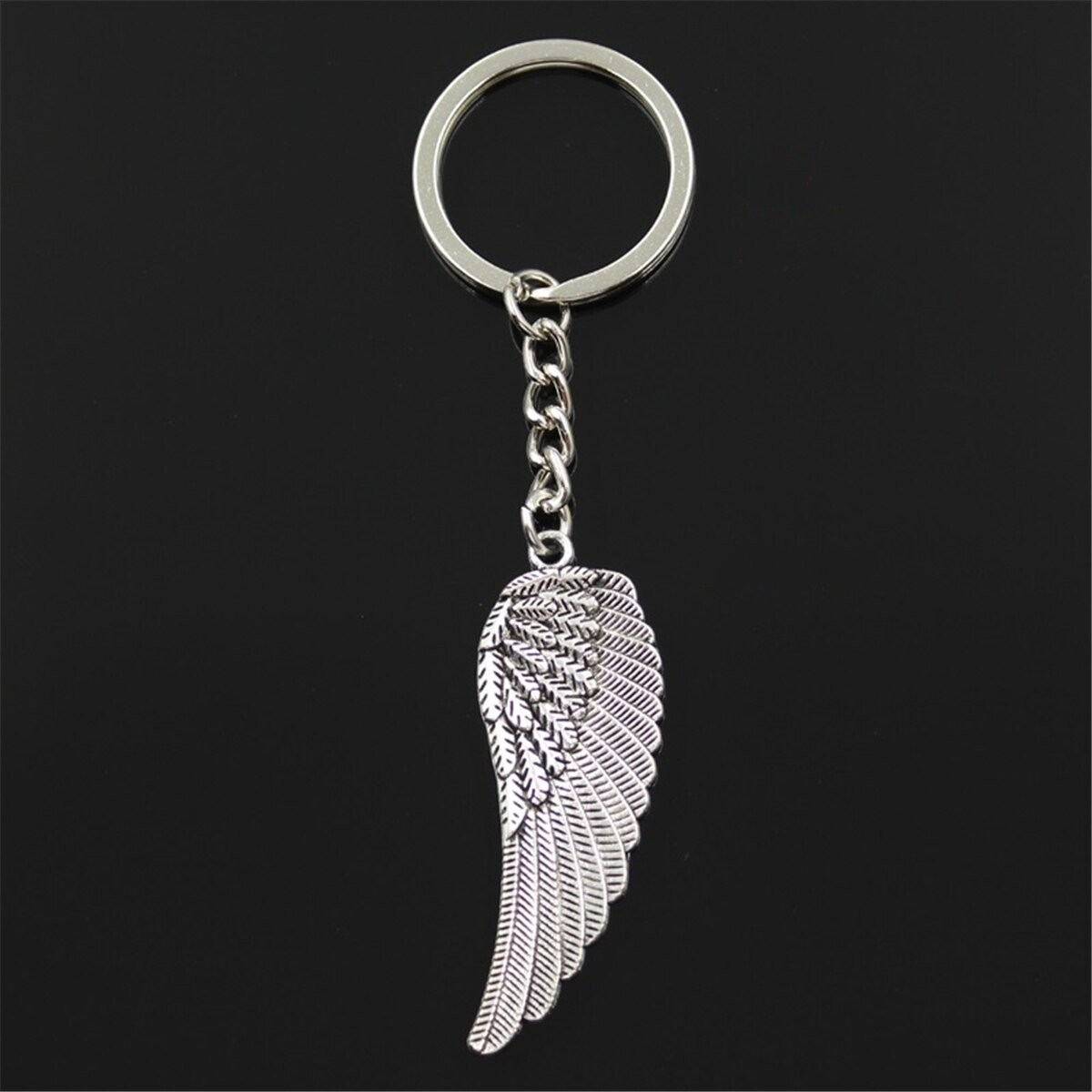 Porte-clés aile d'ange plume argenté - vue 4