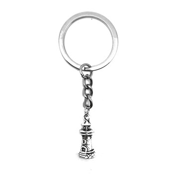 Kleine zilveren vuurtoren sleutelhanger
