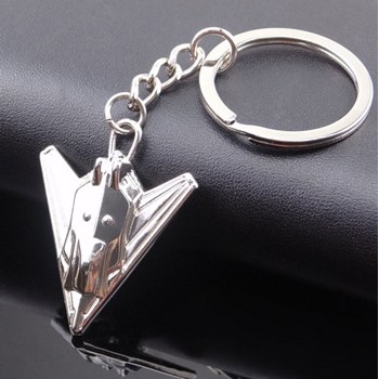 Zilveren stealth vliegtuig sleutelhanger